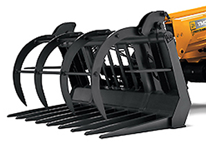 Фото 2. Телеобработчик JCB TM310-52 Loadall с телескопируемой стрелой,установленной перед кабиной, впереди силового отсека. И его вилы с захватом